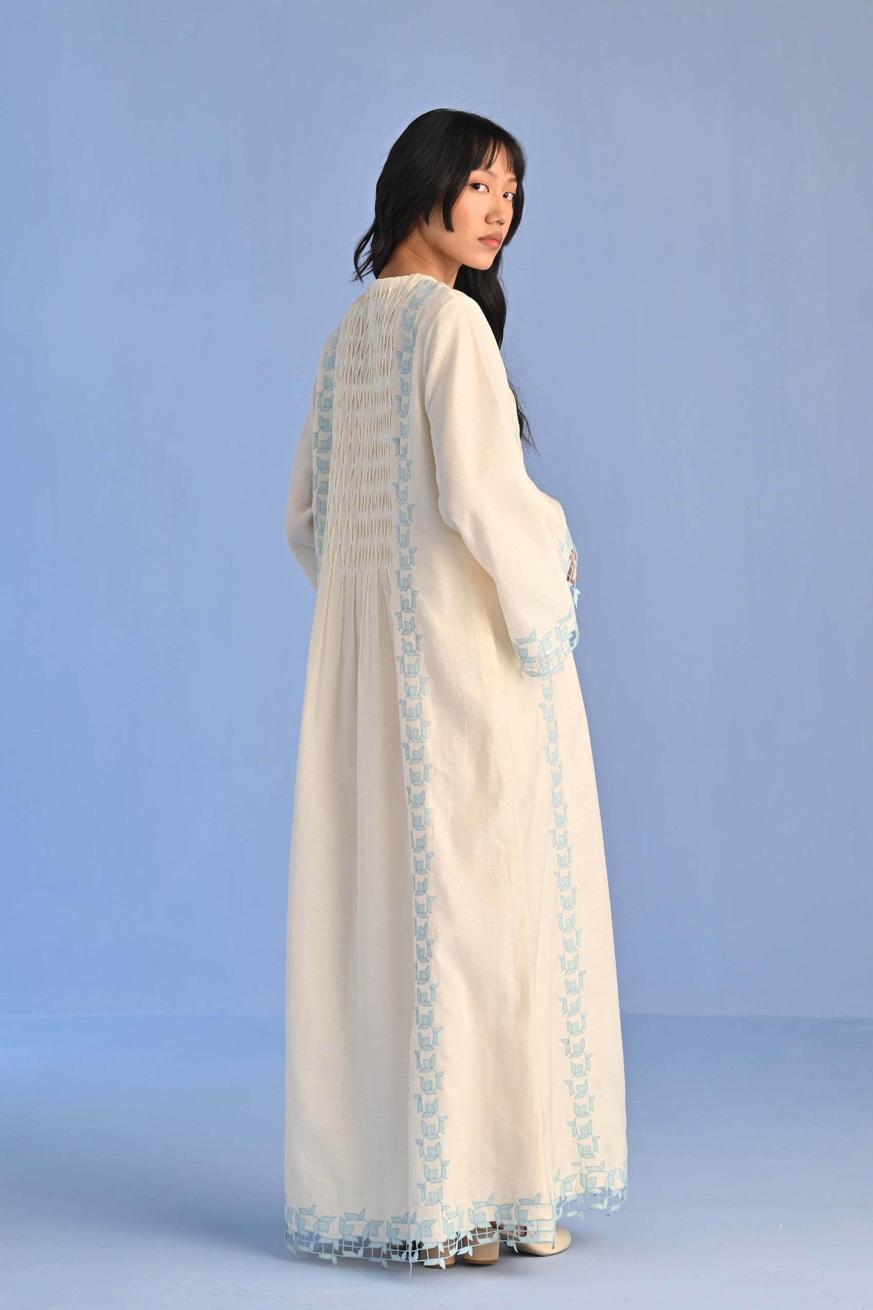 PLEATED DRESS WITH CUTWORK