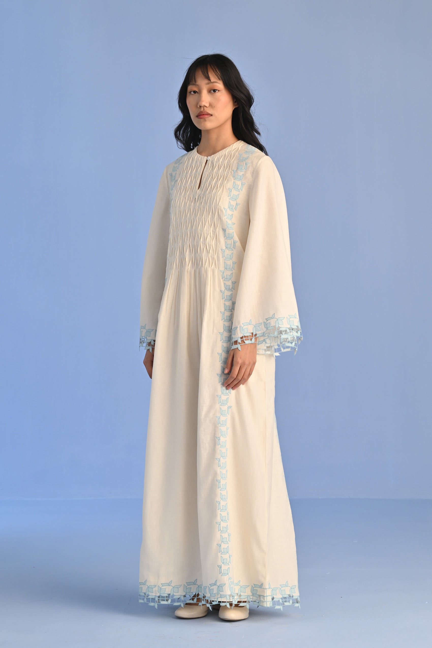 PLEATED DRESS WITH CUTWORK