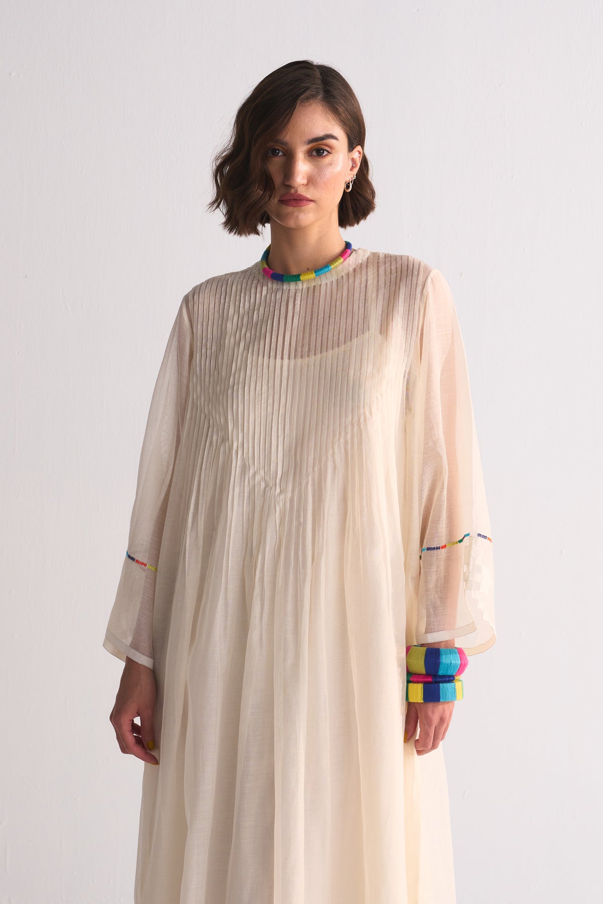 SUPER PLEATED DRESS WITH APPLIQUE', CUTWORK AND THREAD