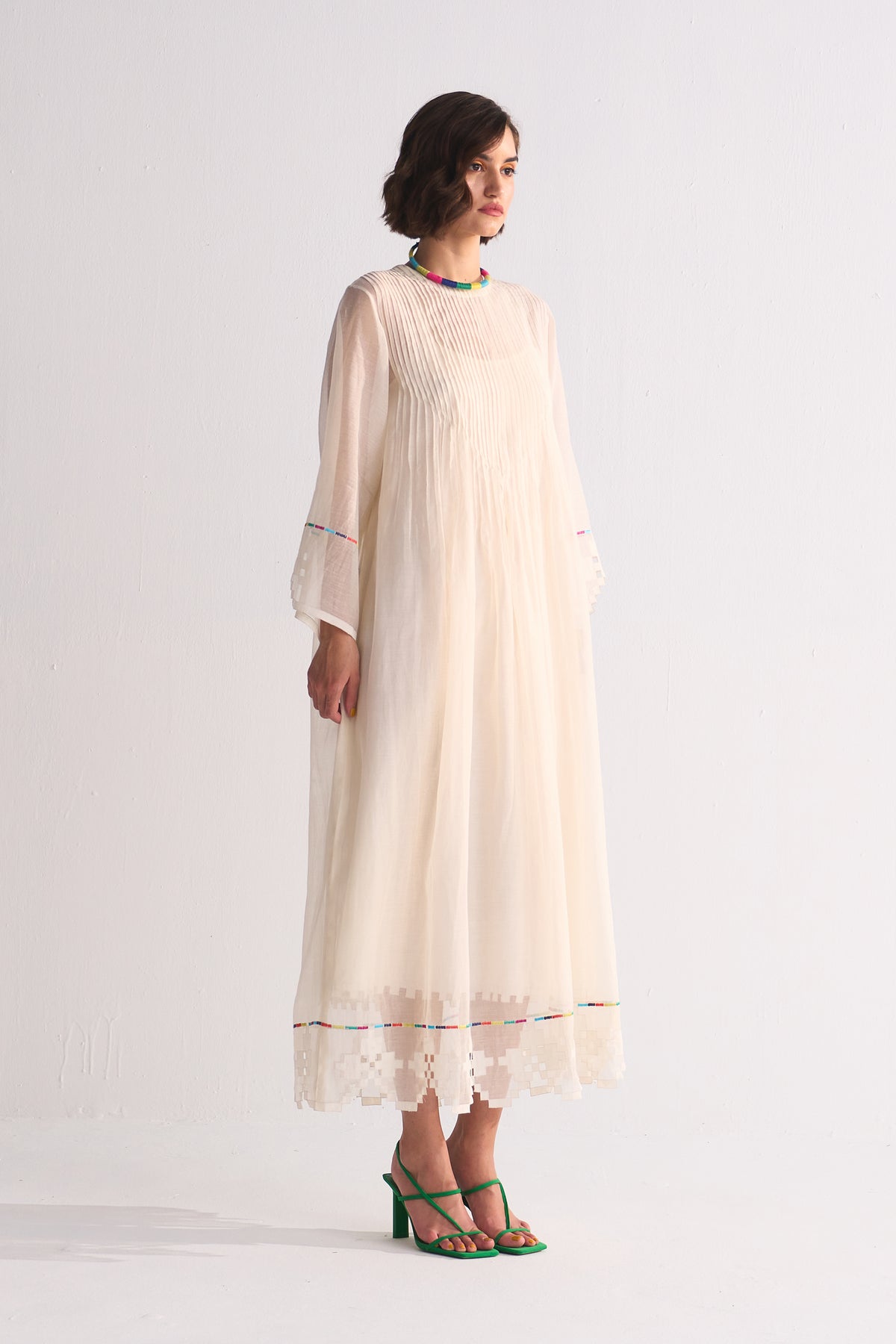 SUPER PLEATED DRESS WITH APPLIQUE', CUTWORK AND THREAD