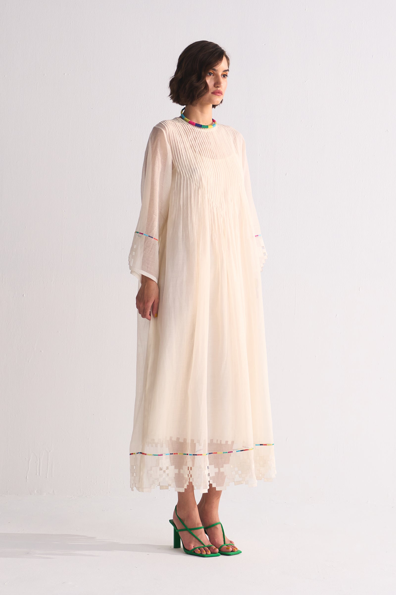 SUPER PLEATED DRESS WITH APPLIQUE', CUTWORK AND THREAD