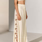 GEOMETRIC FLORAL CUTWORK SIDE PLEATED PANTS