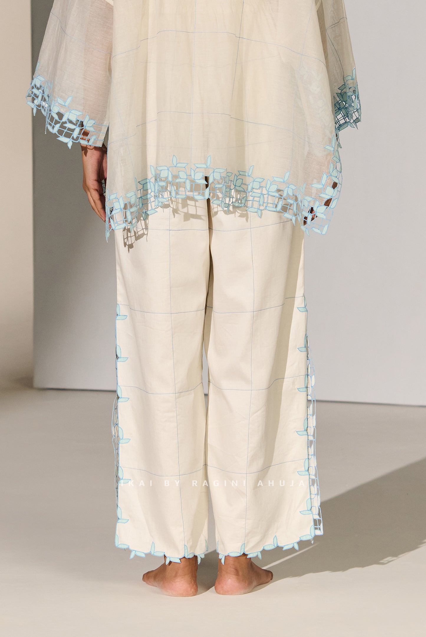 GEOMETRIC FLORAL CUTWORK HIGH SLIT PANTS