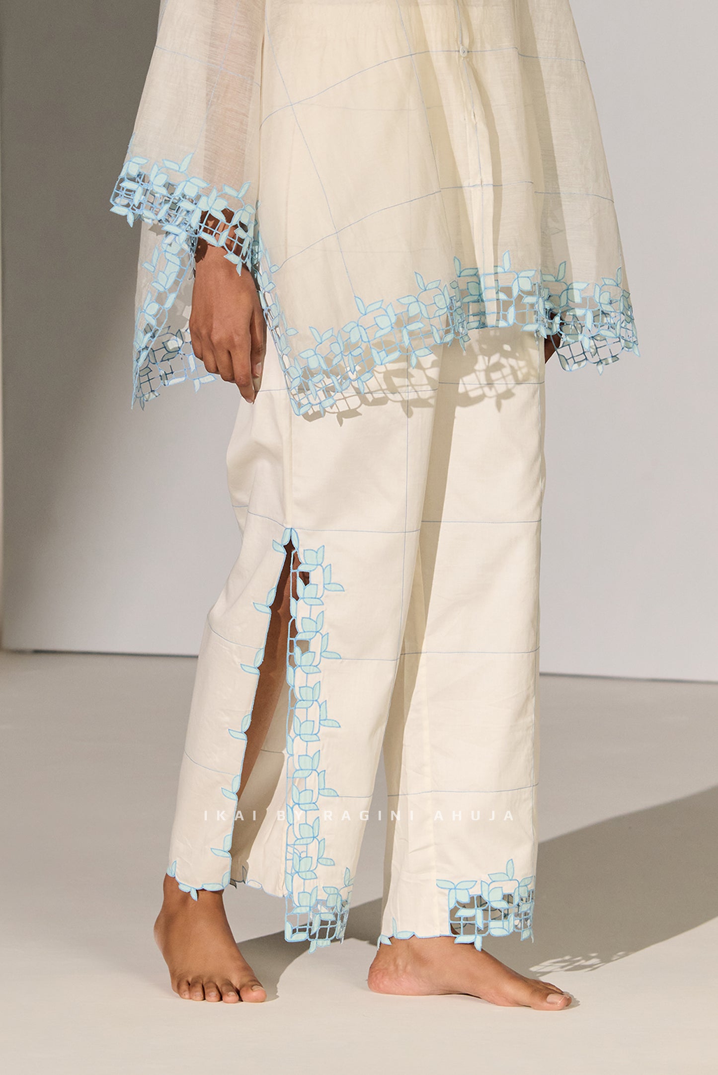 GEOMETRIC FLORAL CUTWORK HIGH SLIT PANTS