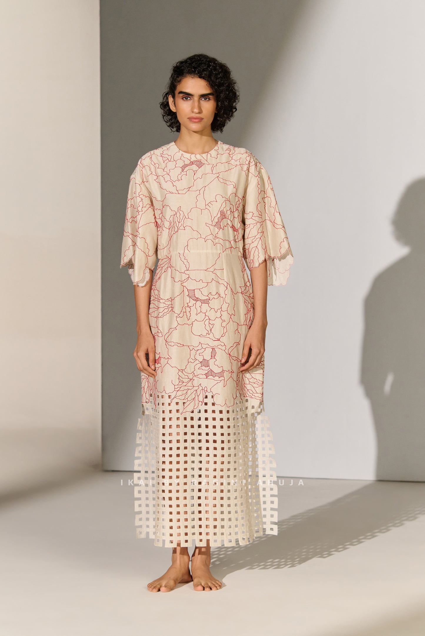 CINCHED WAIST DRESS WITH GEOMETRIC FLORAL CUTWORK